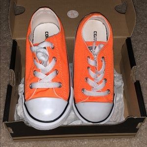 Neon orange converse